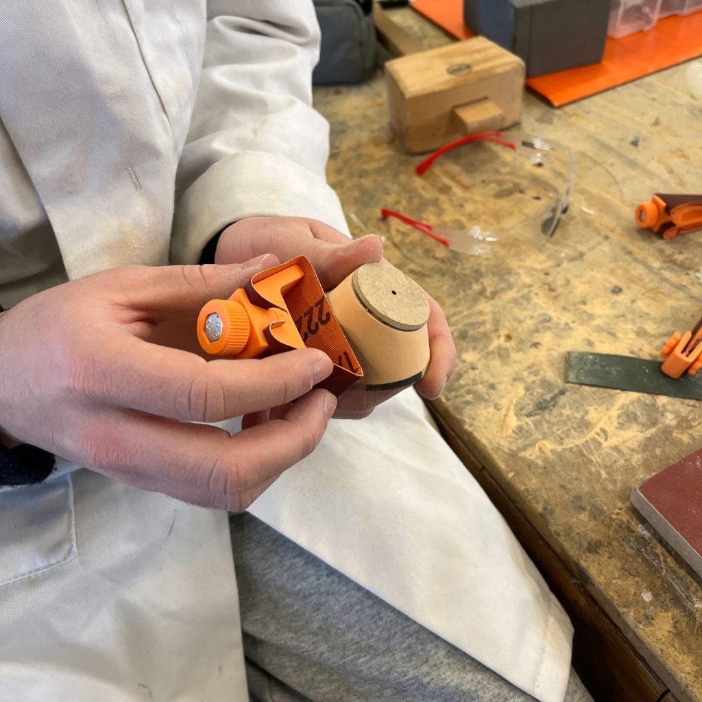 Product design student exploring form and materials through hands-on model making at SETU