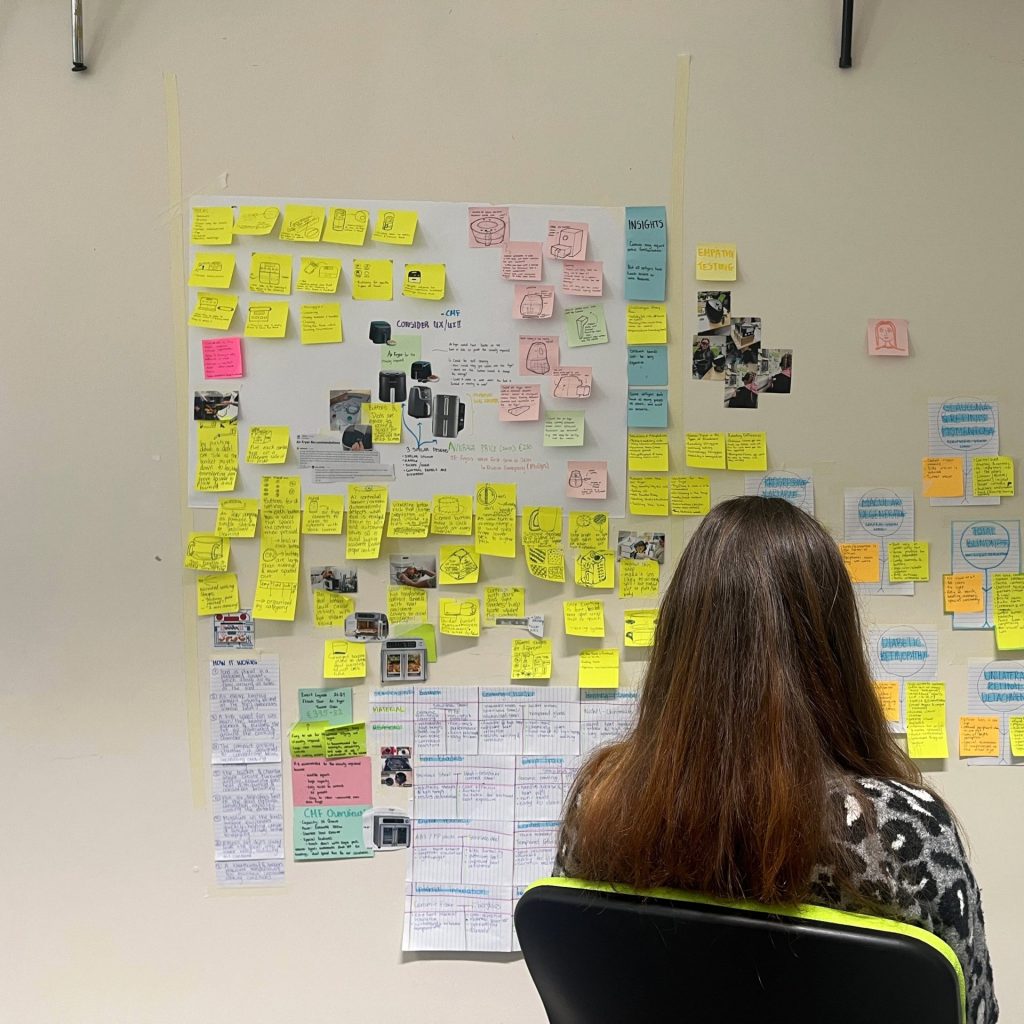 Product design student sketching early concepts during studio-based learning at SETU