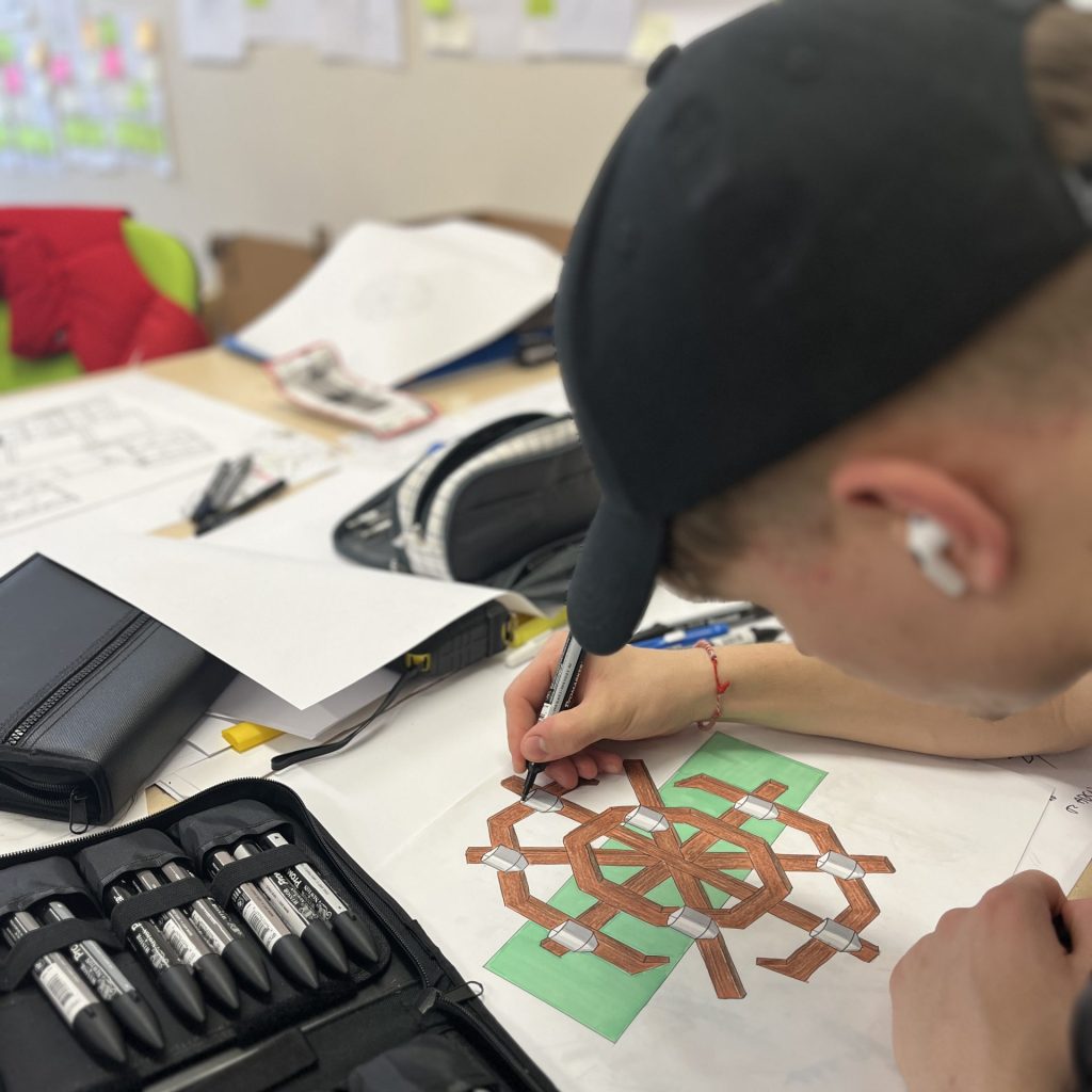 Product design student sketching early concepts during studio-based learning at SETU